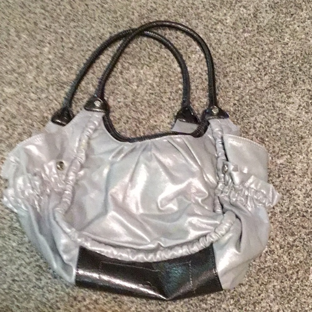 Silver Handbag With Brown Accented Handles & Bottom. In Excellent Condition